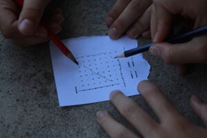 People solving a word search puzzle together